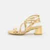 Buffalo CAGE VEGAN - Riemensandalette - Gold -Bequeme Schuhe 6e59c2d1920843229feb6e46f656cf42