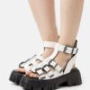Buffalo VEGAN LION TEETH - Plateausandalette - White